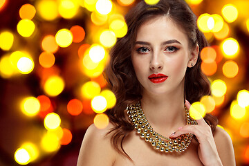 Image showing Beautiful girl and shiny background with lights