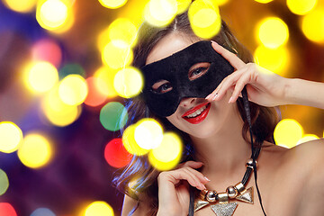 Image showing Beauty model woman wearing venetian masquerade carnival mask at party