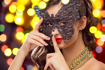 Image showing Beauty model woman wearing venetian masquerade carnival mask at party