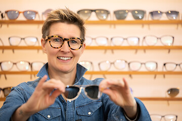 Image showing woman in a eyewear store