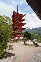 Image showing Red pagoda tower at Itsukushima Shrine in Miyajima island, Japan.