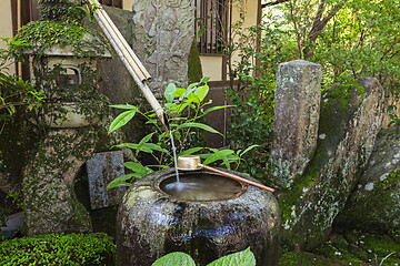 Image showing Traditional japanese bamboo purification fountain for purification at entrance of the Japanese temple.