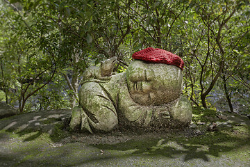 Image showing Rat - symbol of japanese horoscope. Childish Jizo stone statue wearing knitted and cloth hats with zodiac animal.