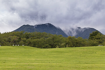 Image showing Mountains background with white cloudy sky. Kawaguchi, Japan.