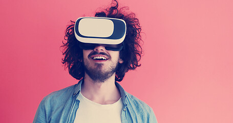 Image showing young man using VR headset glasses of virtual reality