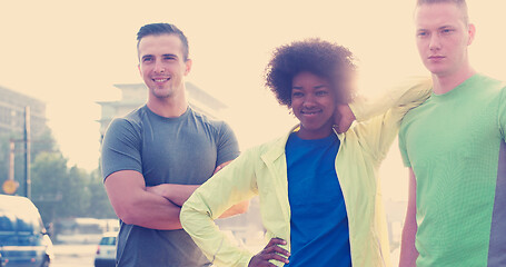 Image showing Portrait of multiethnic group of young people on the jogging