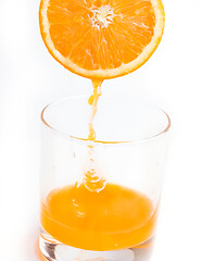 Image showing Squeezed Fresh Orange Shows Citrus Fruit And Beverages  