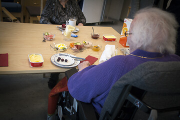 Image showing Wheelchair by the Table