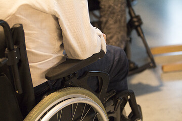 Image showing Wheelchair by the Table