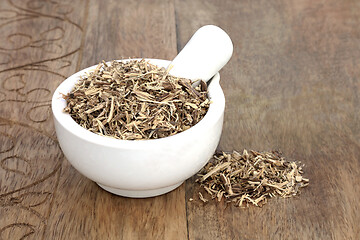 Image showing Nettle Herb Root in a Mortar with Pestle