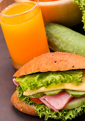 Image showing Juice And Roll Means Orange Drink And Bread 