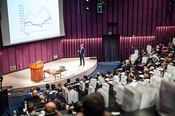 Image showing Speaker giving presentation on business conference event.