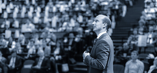 Image showing Public speaker giving talk at Business Event.