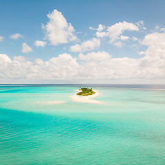 Image showing Picture perfect beach and turquoise lagoon on small tropical island on Maldives