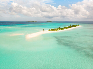 Image showing Picture perfect beach and turquoise lagoon on small tropical island on Maldives