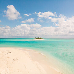 Image showing Picture perfect beach and turquoise lagoon on small tropical island on Maldives