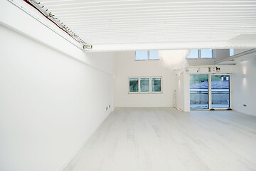 Image showing Interior of empty stylish modern open space two level apartment