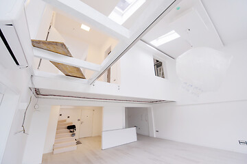 Image showing Interior of empty stylish modern open space two level apartment