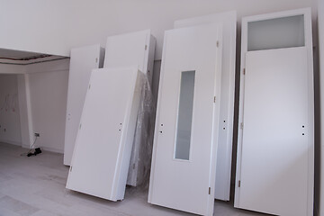 Image showing Interior doors stacked in a new apartment