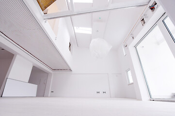 Image showing Interior of empty stylish modern open space two level apartment