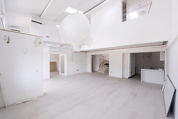 Image showing Interior of empty stylish modern open space two level apartment