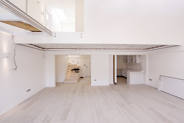 Image showing Interior of empty stylish modern open space two level apartment