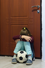 Image showing Upset girl is not allowed to walk with the ball on the street