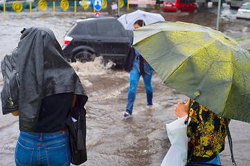 Image showing People in flooded rainy city