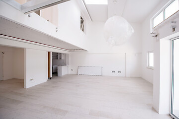 Image showing Interior of empty stylish modern open space two level apartment