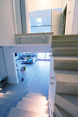 Image showing stylish interior with wooden stairs