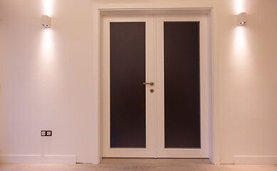 Image showing double glass door with white wooden frame