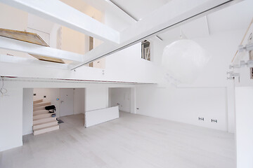 Image showing Interior of empty stylish modern open space two level apartment