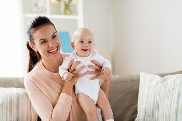 Image showing happy mother with little baby boy at home