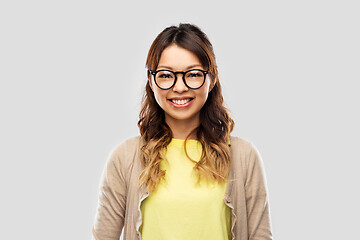 Image showing happy asian woman in glasses or student