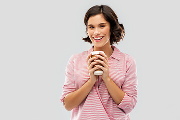 Image showing woman drinking takeaway coffee in paper cup