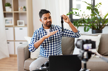 Image showing male blogger with smart watch recording video blog