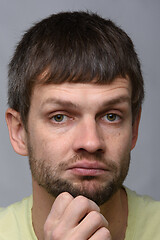 Image showing Closeup portrait of a skeptical man of European appearance