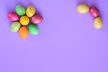 Image showing Easter eggs in the shape of a flower on a purple background