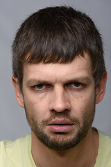 Image showing Close-up portrait of a gloomy man of European appearance