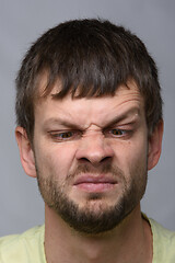 Image showing Closeup portrait of a man looking at his nose, European appearance