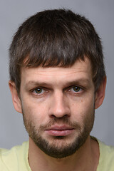 Image showing Closeup portrait of an upset crying man of European appearance