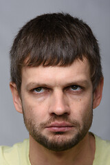 Image showing Close-up portrait of a gloomy tired man of European appearance