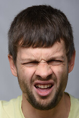 Image showing Portrait of a man who smelled, European appearance and close-up