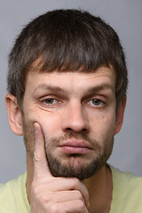 Image showing Closeup portrait of a sad and pensive man of European appearance