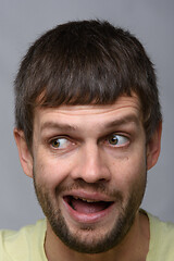 Image showing Close-up portrait of a stunned man of European appearance