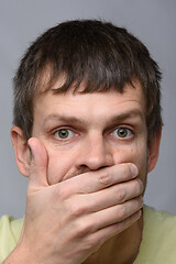 Image showing Close-up portrait of a man of European appearance, depicting a fright