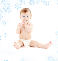 Image showing baby boy in diaper with toothbrush