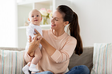 Image showing happy mother with little baby boy at home