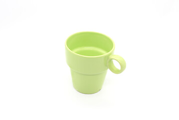 Image showing Bright green ceramic cup with handle