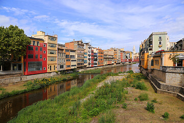 Image showing Colorful houses and Eiffel bridge and river Onyar in Girona